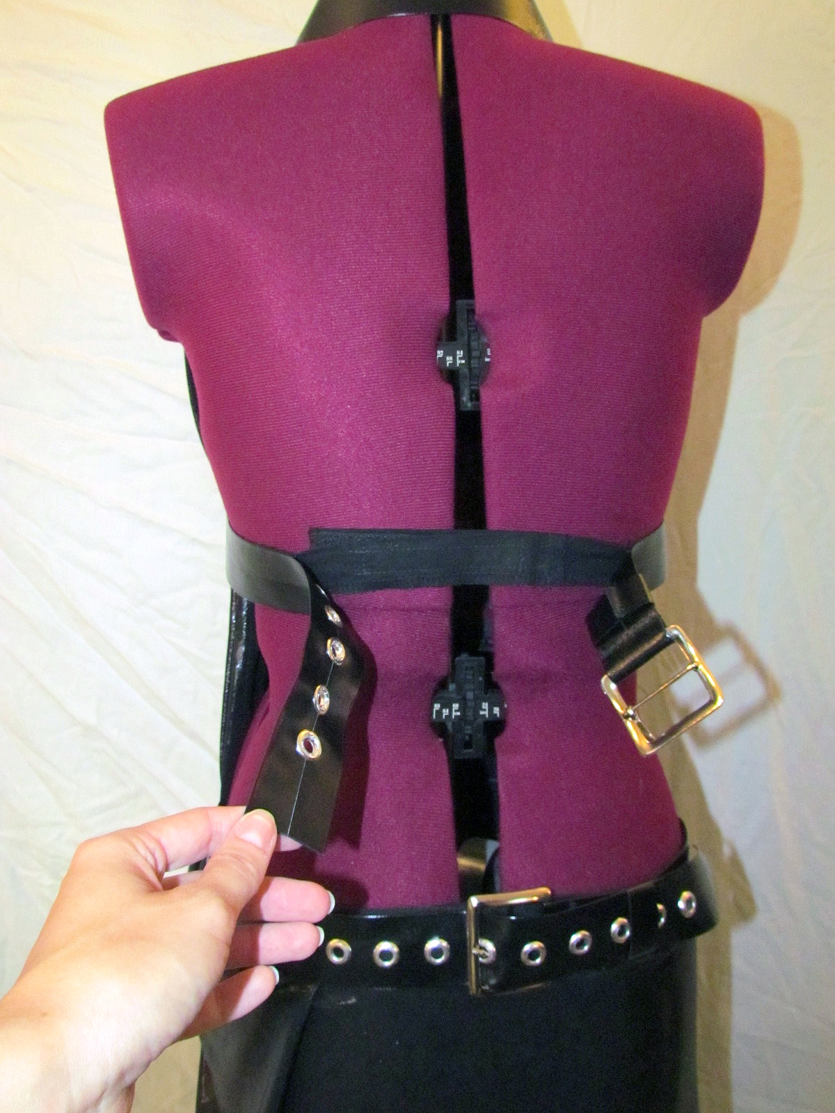 mock belting underneath real belt